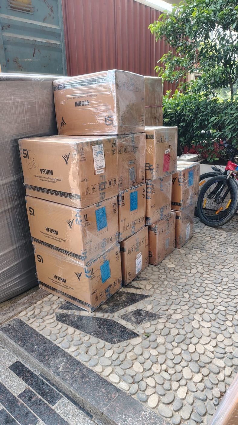 Stacked, labelled cartons ready for an office move