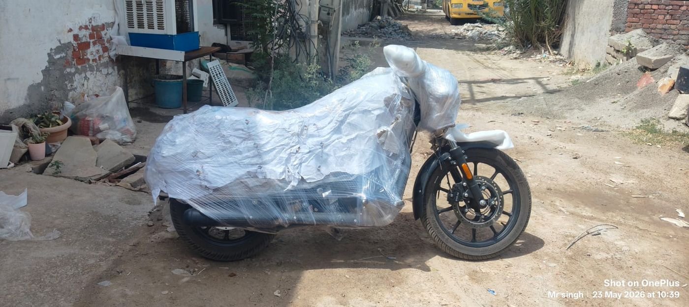 Scooter wrapped in protective film, ready for transport